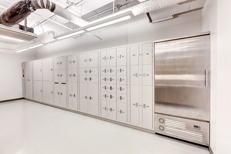 Secure evidence lockers at Salt Lake City Public Safety Building. Large white room with white lockers