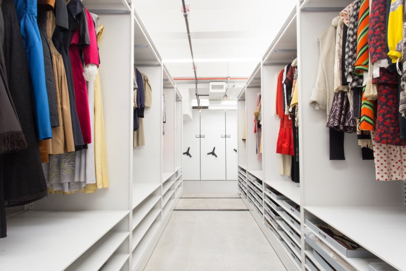 Space saver fashion storage closet filled with colorful clothes