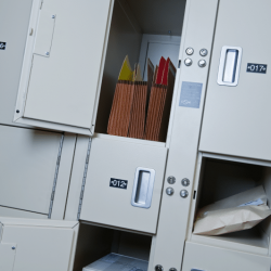 Baker McKenzie evidence locker, open with files showing from the inside